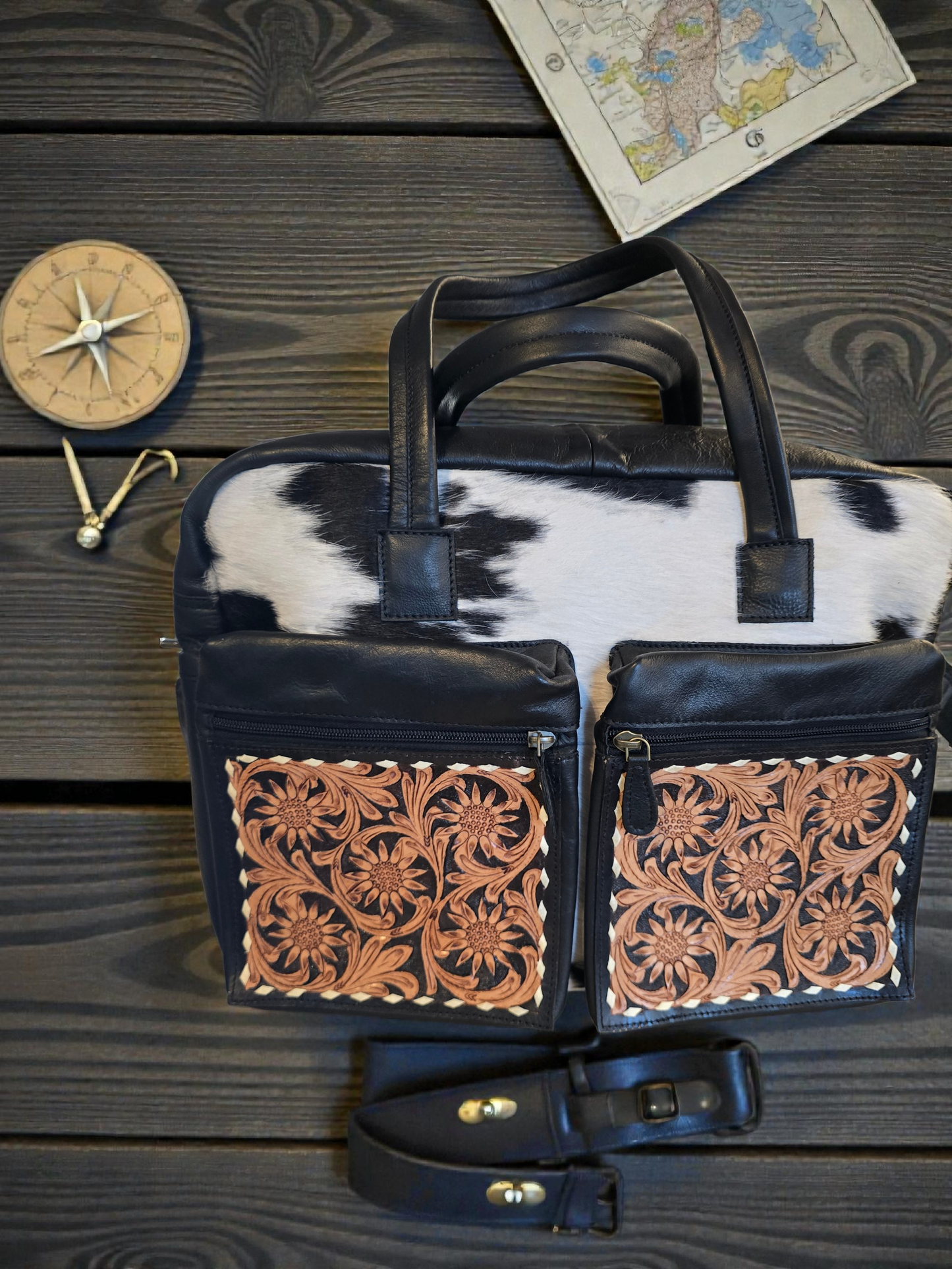 Cowhide and hand-tooled leather bag